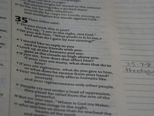 a close up of a book with writing on it