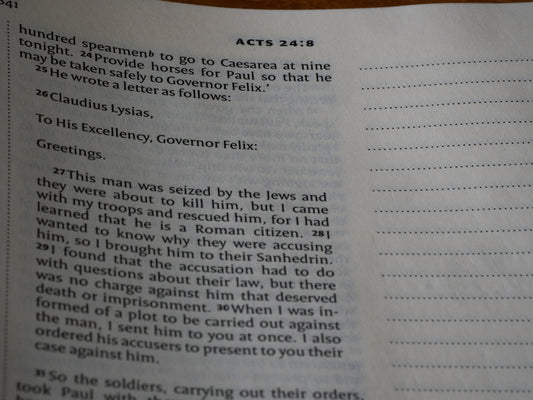 A close up of an open book on a table