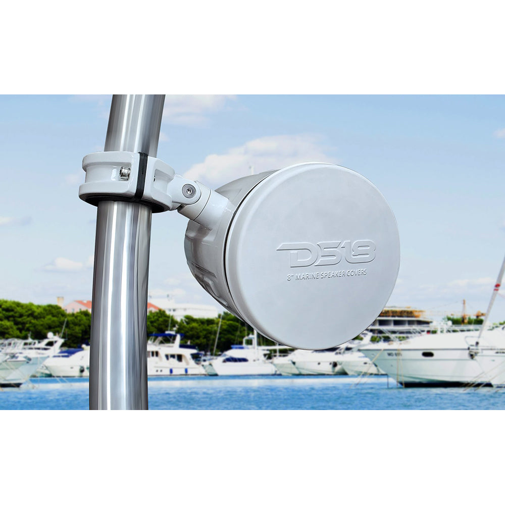 DS18 Silicone Marine Speaker Cover for 6.5" speakers in white, mounted on a pole with boats in the background.